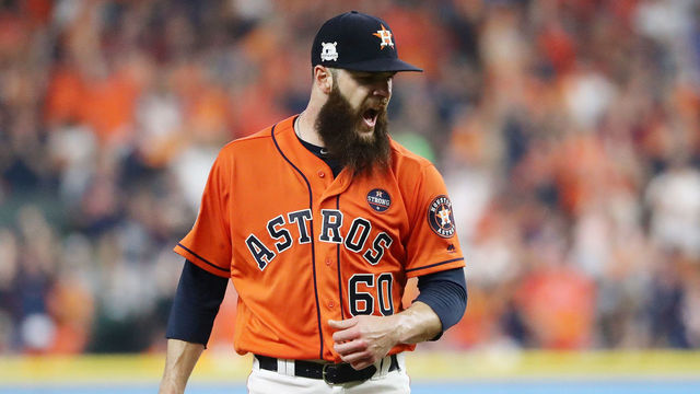 HOUSTON, TX - OCTOBER 13: Dallas Keuchel #60 of the Houston Astros reacts after striking out Aaron Judge #99 of the New York Yankees to end the top of the third inning during game one of the American League Championship Series at Minute Maid Park on October 13, 2017 in Houston, Texas.
