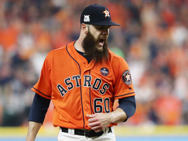 HOUSTON, TX - OCTOBER 13: Dallas Keuchel #60 of the Houston Astros reacts after striking out Aaron Judge #99 of the New York Yankees to end the top of the third inning during game one of the American League Championship Series at Minute Maid Park on October 13, 2017 in Houston, Texas.