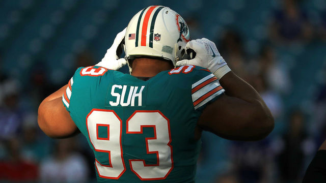 MIAMI GARDENS, FL - DECEMBER 31: Ndamukong Suh #93 of the Miami Dolphins during pregame against the Buffalo Bills at Hard Rock Stadium on December 31, 2017 in Miami Gardens, Florida.