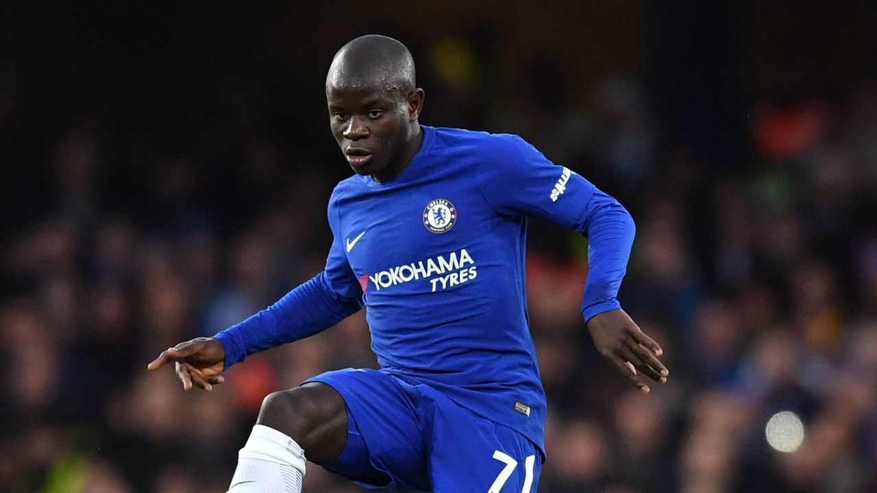 Chelsea's French midfielder N'Golo Kante passes the ball during the English Premier League football match between Chelsea and Brighton and Hove Albion at Stamford Bridge in London on December 26, 2017. / AFP PHOTO / Ben STANSALL /