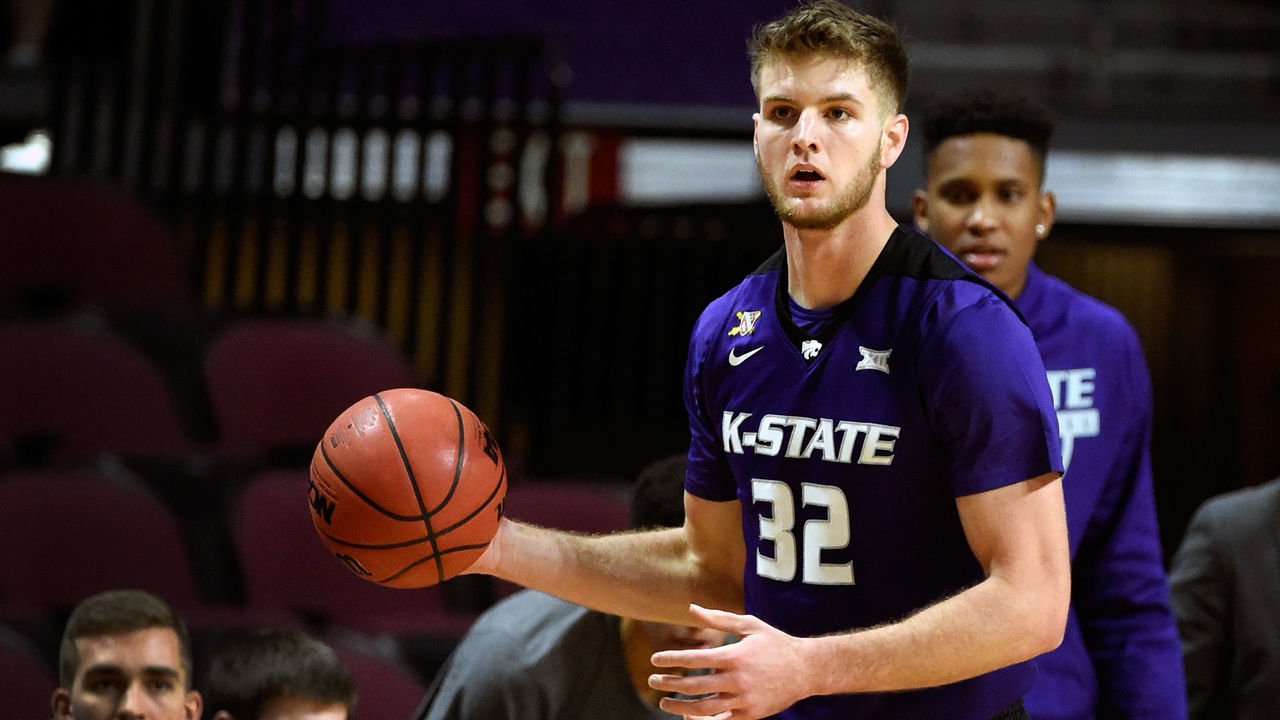 LAS VEGAS, NV - NOVEMBER 24: Dean Wade #32 of the Kansas State Wildcats looks on with the ball against the George Washington Colonials during the 2017 Continental Tire Las Vegas Invitational basketball tournament at the Orleans Arena on November 24, 2017 in Las Vegas, Nevada. Kansas State won 67-59.