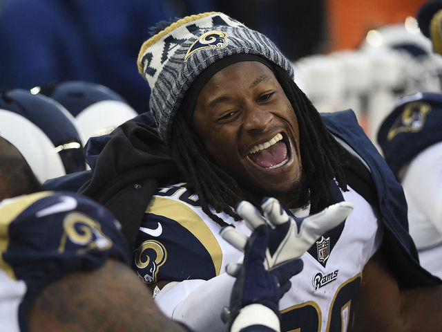 SEATTLE, WA - DECEMBER 17: Running back Todd Gurley #30 of the Los Angeles Rams laughs on the sidelines during the fourth quarter of the game against the Seattle Seahawks at CenturyLink Field on December 17, 2017 in Seattle, Washington. The Seahawks won the game 42-7.