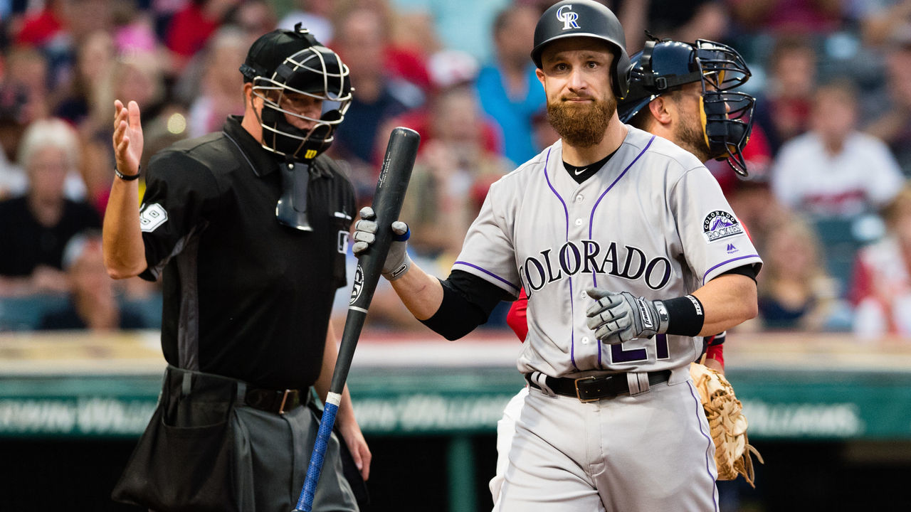 CLEVELAND, OH - AUGUST 8: Jonathan Lucroy #21 of the Colorado Rockies reacts after striking out to end the top of the fifth inning against the Cleveland Indians at Progressive Field on August 8, 2017 in Cleveland, Ohio.