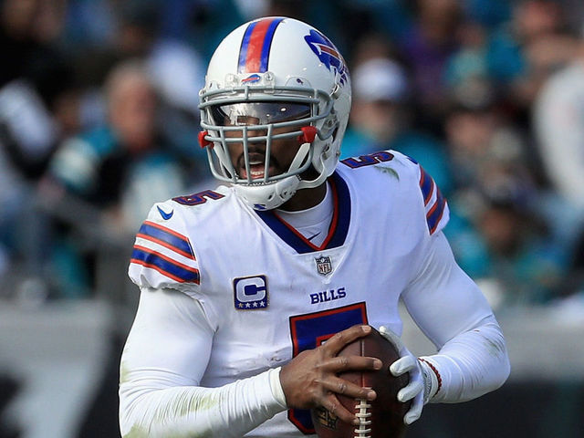 JACKSONVILLE, FL - JANUARY 07: Quarterback Tyrod Taylor #5 of the Buffalo Bills rolls out to pass in the third quarter against the Jacksonville Jaguars during the AFC Wild Card Playoff game at EverBank Field on January 7, 2018 in Jacksonville, Florida.