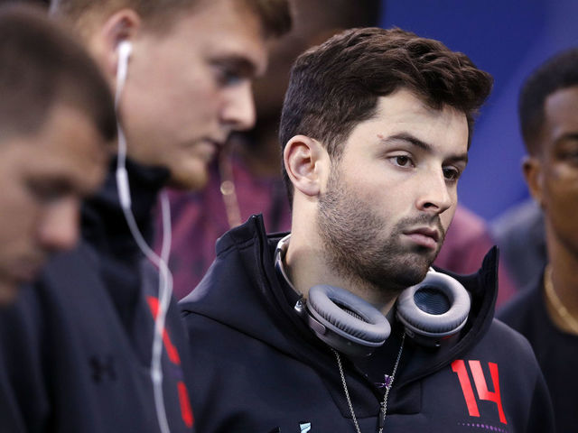 INDIANAPOLIS, IN - MARCH 03: Oklahoma quarterback Baker Mayfield looks on during the NFL Combine at Lucas Oil Stadium on March 3, 2018 in Indianapolis, Indiana.