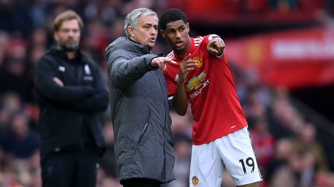 MANCHESTER, ENGLAND - MARCH 10: Jose Mourinho, Manager of Manchester United speaks with Marcus Rashford during the Premier League match between Manchester United and Liverpool at Old Trafford on March 10, 2018 in Manchester, England.