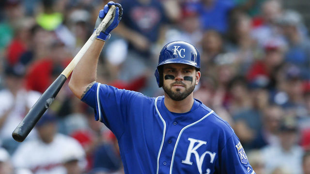 CLEVELAND, OH - SEPTEMBER 16: Mike Moustakas #8 of the Kansas City Royals reacts after being struck out by Starting pitcher Carlos Carrasco #59 of the Cleveland Indians during the sixth inning at Progressive Field on September 16, 2017 in Cleveland, Ohio. The Indians defeated the Royals 8-4.