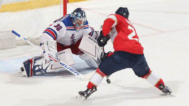 SUNRISE, FL - MARCH 10: Vincent Trocheck #21 of the Florida Panthers skates in on goaltender Henrik Lundqvist #30 of the New York Rangers to score the game winning goal in the shootout at the BB&T Center on March 10, 2018 in Sunrise, Florida. The Panthers defeated the Rangers 4-3 in a shootout.