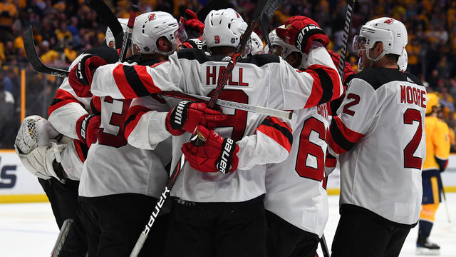 Devils snap Preds' 10-game win streak in shootout