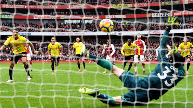LONDON, ENGLAND - MARCH 11: Troy Deeney of Watford sees his penalty saved by Petr Cech of Arsenal during the Premier League match between Arsenal and Watford at Emirates Stadium on March 11, 2018 in London, England.