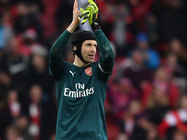 Arsenal's Czech goalkeeper Petr Cech applauds supporters on the pitch after the English Premier League football match between Arsenal and Watford at the Emirates Stadium in London on March 11, 2018. Arsenal won the game 3-0. / AFP PHOTO / Ben STANSALL /