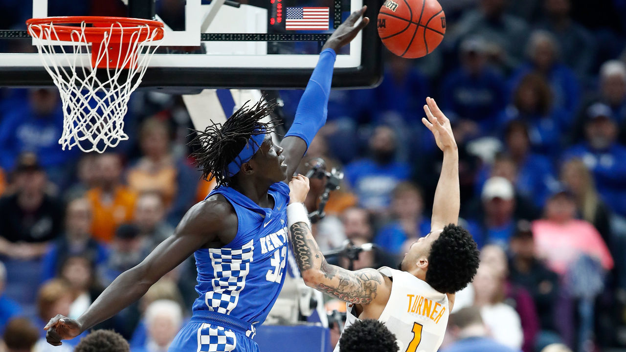 ST LOUIS, MO - MARCH 11: Wenyen Gabriel #32 of the Kentucky Wildcatsblocks the shot of Lamonte Turner #1 of the Tennessee Volunteers during the Championship game of the 2018 SEC Basketball Tournament at Scottrade Center on March 11, 2018 in St Louis, Missouri.