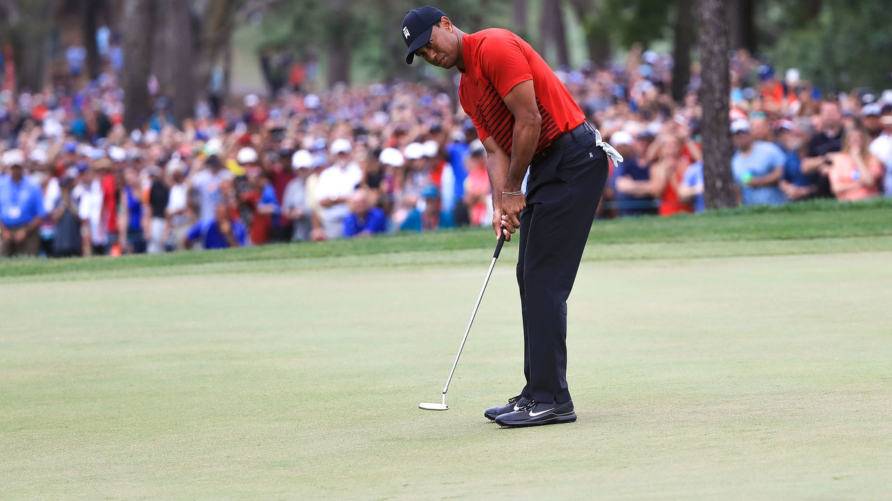 PALM HARBOR, FL - MARCH 11: Tiger Woods putts on the 18th green during the final round of the Valspar Championship at Innisbrook Resort Copperhead Course on March 11, 2018 in Palm Harbor, Florida.