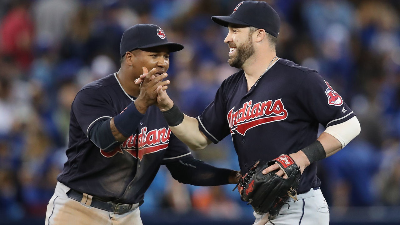 TORONTO, CANADA - JUNE 30: Jason Kipnis #22 of the Cleveland Indians celebrates their victory with Jose Ramirez #11 during MLB game action against the Toronto Blue Jays on June 30, 2016 at Rogers Centre in Toronto, Ontario, Canada.