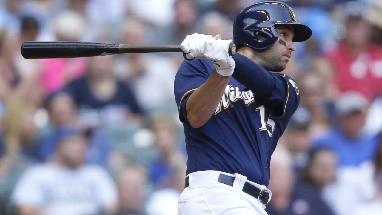 MILWAUKEE, WI - SEPTEMBER 03: Neil Walker #15 of the Milwaukee Brewers hits a double during the sixth inning against the Washington Nationals at Miller Park on September 03, 2017 in Milwaukee, Wisconsin.