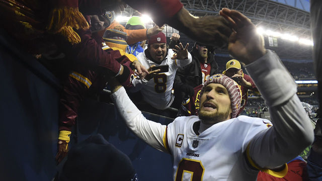 SEATTLE, WA - NOVEMBER 05: Quarterback Kirk Cousins #8 of the Washington Redskins celebrates with fans after the game against the Seattle Seahawks at CenturyLink Field on November 5, 2017 in Seattle, Washington. The Redskins won 17-14.