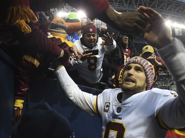 SEATTLE, WA - NOVEMBER 05: Quarterback Kirk Cousins #8 of the Washington Redskins celebrates with fans after the game against the Seattle Seahawks at CenturyLink Field on November 5, 2017 in Seattle, Washington. The Redskins won 17-14.