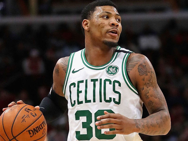 CHICAGO, IL - MARCH 05: Marcus Smart #36 of the Boston Celtics brings the ball up the court against the Chicago Bulls at the United Center on March 5, 2018 in Chicago, Illinois. The Celtics defeated the Bulls 105-89.