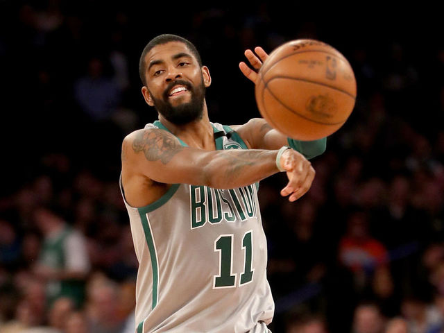 NEW YORK, NY - FEBRUARY 24: Kyrie Irving #11 of the Boston Celtics passes the ball in the second half against the New York Knicks at Madison Square Garden on February 24,2018 in New York City.