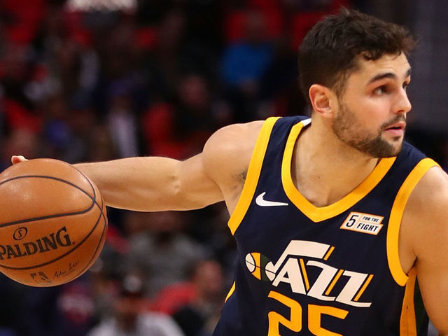 DETROIT, MI - JANUARY 24: Raul Neto #25 of the Utah Jazz brings the ball up court while playing the Detroit Pistons at Little Caesars Arena on January 24, 2018 in Detroit, Michigan.