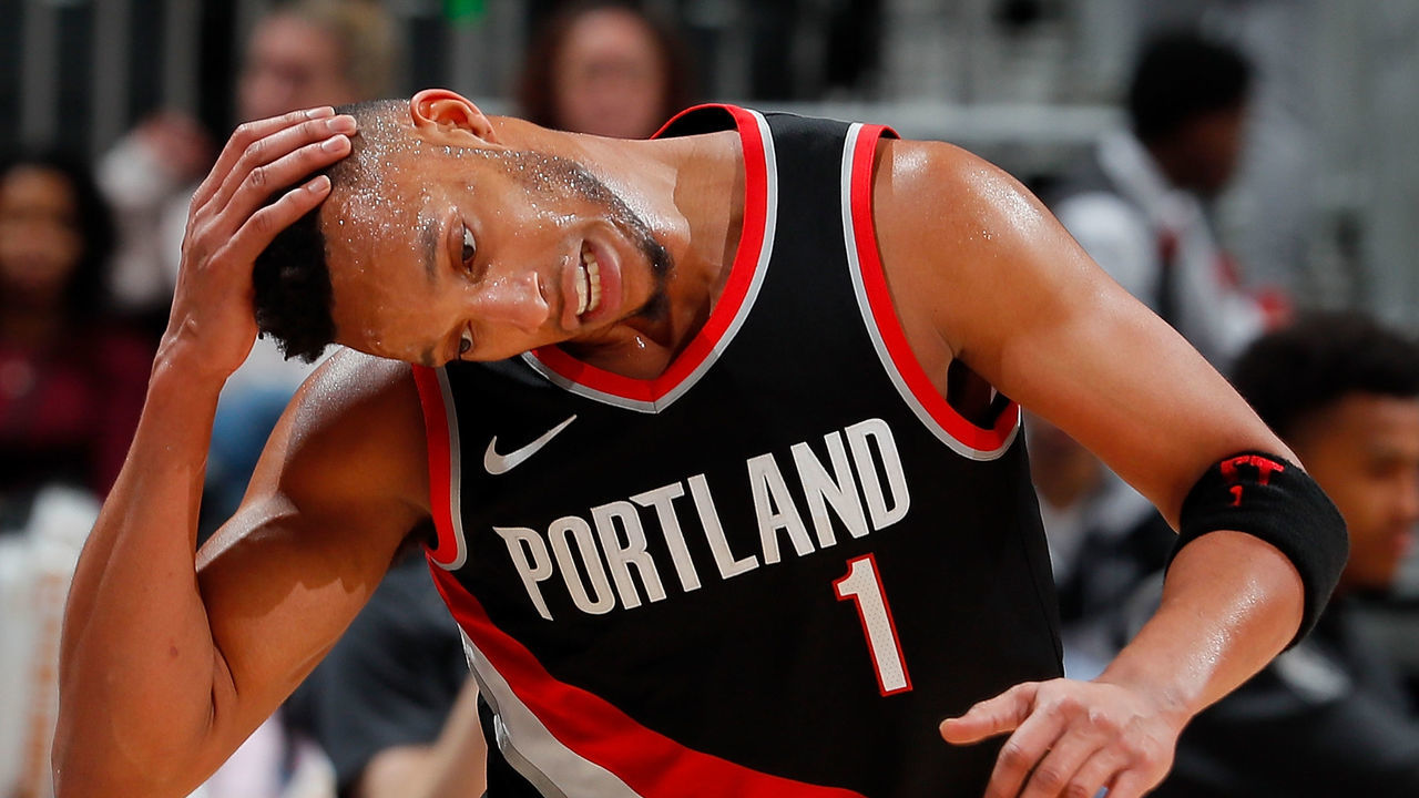 ATLANTA, GA - DECEMBER 30: Evan Turner #1 of the Portland Trail Blazers pulls down on his head as he runs down the court against the Atlanta Hawks at Philips Arena on December 30, 2017 in Atlanta, Georgia.