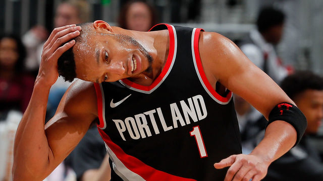 ATLANTA, GA - DECEMBER 30: Evan Turner #1 of the Portland Trail Blazers pulls down on his head as he runs down the court against the Atlanta Hawks at Philips Arena on December 30, 2017 in Atlanta, Georgia.