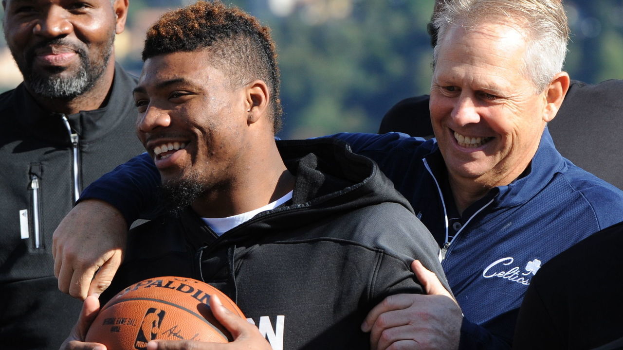 LAKE COMO - OCTOBER 4: Marcus Smart and President of Basketball Operations, Danny Ainge, pose for a portrait during the 2015 Global Games on October 4, 2015 in Cernobbio, Italy with Lake Como in the background. Mandatory Copyright Notice: Copyright 2014 NBAE