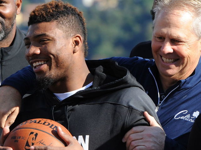 LAKE COMO - OCTOBER 4: Marcus Smart and President of Basketball Operations, Danny Ainge, pose for a portrait during the 2015 Global Games on October 4, 2015 in Cernobbio, Italy with Lake Como in the background. Mandatory Copyright Notice: Copyright 2014 NBAE