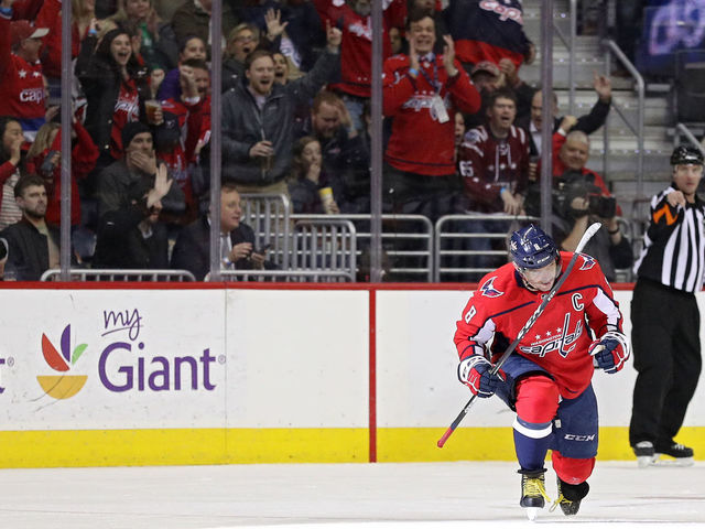 WASHINGTON, DC - MARCH 12: Alex Ovechkin #8 of the Washington Capitals celebrates after scoring his 599th career goal against the Winnipeg Jets during the first period at Capital One Arena on March 12, 2018 in Washington, DC.