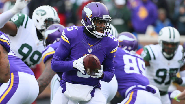 MINNEAPOLIS, MN - DECEMBER 7: Teddy Bridgewater #5 of the Minnesota Vikings hands off the ball against the New York Jets in the second quarter on December 7, 2014 at TCF Bank Stadium in Minneapolis, Minnesota.