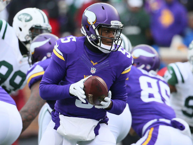 MINNEAPOLIS, MN - DECEMBER 7: Teddy Bridgewater #5 of the Minnesota Vikings hands off the ball against the New York Jets in the second quarter on December 7, 2014 at TCF Bank Stadium in Minneapolis, Minnesota.