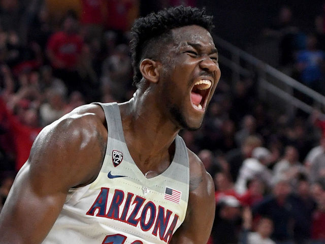 LAS VEGAS, NV - MARCH 10: Deandre Ayton #13 of the Arizona Wildcats reacts after dunking against the USC Trojans during the championship game of the Pac-12 basketball tournament at T-Mobile Arena on March 10, 2018 in Las Vegas, Nevada. The Wildcats won 75-61.