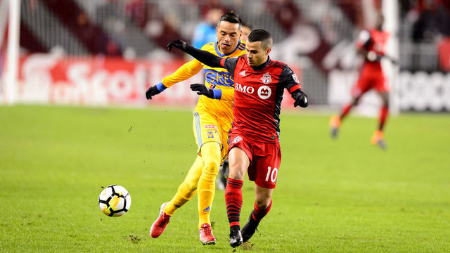 TORONTO, ON - MARCH 07: Juninho (3) of Tigres UANL attempts to stop Sebastian Giovinco (10) of Toronto FC during the first half of the CONCACAF Champions League Quarter-final match between Toronto FC and Tigres UANL on March 7, 2018, at BMO Field in Toronto, ON, Canada. (Photograph by Julian Avram/Icon Sportswire via Getty Images)