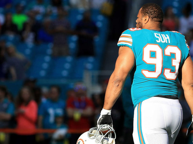MIAMI GARDENS, FL - DECEMBER 31: Ndamukong Suh #93 of the Miami Dolphins during pregame against the Buffalo Bills at Hard Rock Stadium on December 31, 2017 in Miami Gardens, Florida.