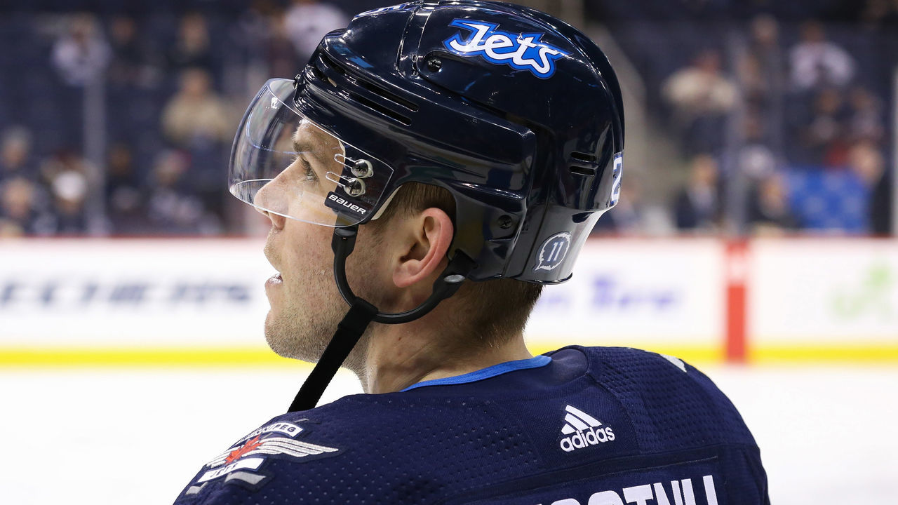 WINNIPEG, MB - FEBRUARY 27: Paul Stastny #25 of the Winnipeg Jets looks on during the pre-game warm up prior to NHL action against the Nashville Predators at the Bell MTS Place on February 27, 2018 in Winnipeg, Manitoba, Canada. This game marked Stastny's debut with the Jets.