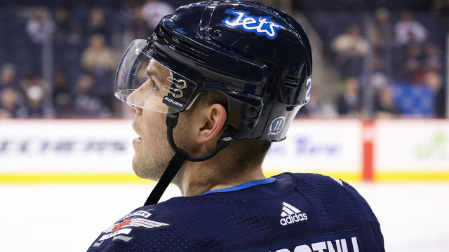 WINNIPEG, MB - FEBRUARY 27: Paul Stastny #25 of the Winnipeg Jets looks on during the pre-game warm up prior to NHL action against the Nashville Predators at the Bell MTS Place on February 27, 2018 in Winnipeg, Manitoba, Canada. This game marked Stastny's debut with the Jets.
