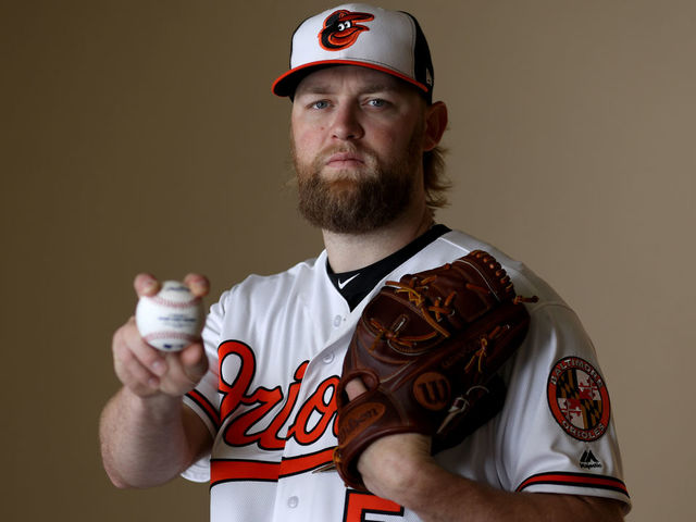 SARASOTA, FL - FEBRUARY 20: Pitcher Andrew Cashner #54 of the Baltimore Orioles poses for a photo during photo days at Ed Smith Stadium on February 20, 2018 in Sarasota, FL.
