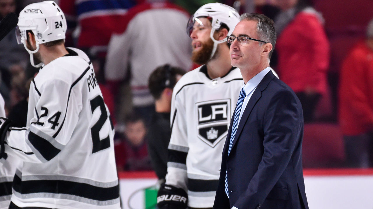 MONTREAL, QC - OCTOBER 26: Head coach of the Los Angeles Kings John Stevens walks past his team celebrating against the Montreal Canadiens during the NHL game at the Bell Centre on October 26, 2017 in Montreal, Quebec, Canada. The Los Angeles Kings defeated the Montreal Canadiens 4-0.