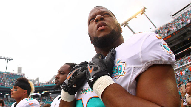 MIAMI GARDENS, FL - SEPTEMBER 27: Ndamukong Suh #93 of the Miami Dolphins looks on before the game against the Buffalo Bills at Sun Life Stadium on September 27, 2015 in Miami Gardens, Florida.