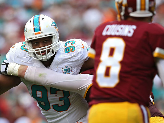 LANDOVER, MD - SEPTEMBER 13: Defensive tackle Ndamukong Suh #93 of the Miami Dolphins in action against the Washington Redskins at FedExField on September 13, 2015 in Landover, Maryland.