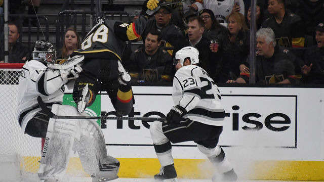 LAS VEGAS, NV - FEBRUARY 27: Nate Schmidt #88 of the Vegas Golden Knights crashes into Jack Campbell #1 of the Los Angeles Kings as Dustin Brown #23 of the Kings looks on in the first period of their game at T-Mobile Arena on February 27, 2018 in Las Vegas, Nevada. Schmidt recieved a two-minute minor penalty for interference on the play.