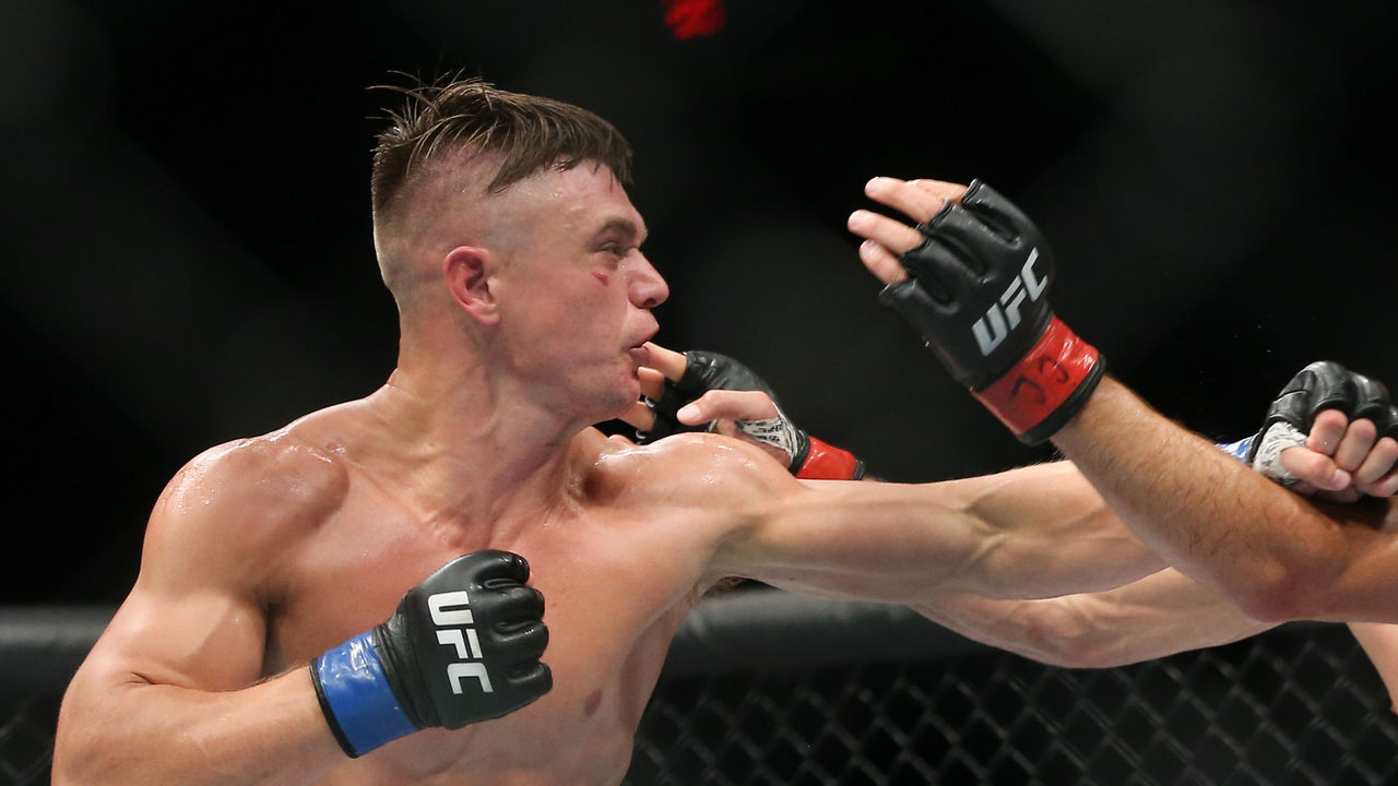 UNIONDALE, NY - JULY 22: Chris Wade (L) lands a left hand on Frankie Perez (R) during their UFC Fight Night lightweight bout at the Nassau Veterans Memorial Coliseum on July 22, 2017 in Uniondale, New York.