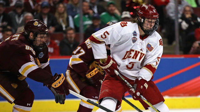 CHICAGO, IL - APRIL 08: Henrik Borgstrom #5 of the Denver Pioneers is pressure by Nick Wolff #5 of the Minnesota-Duluth Bulldogs during the 2017 NCAA Division I Men's Ice Hockey Championship game at the United Center on April 8, 2017 in Chicago, Illinois. Denver defeated Minnesota-Duluth 3-2.