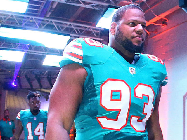 MIAMI GARDENS, FL - DECEMBER 14: Ndamukong Suh #93 of the Miami Dolphins prepares to take the field before the game against the New York Giants at Sun Life Stadium on December 14, 2015 in Miami Gardens, Florida.