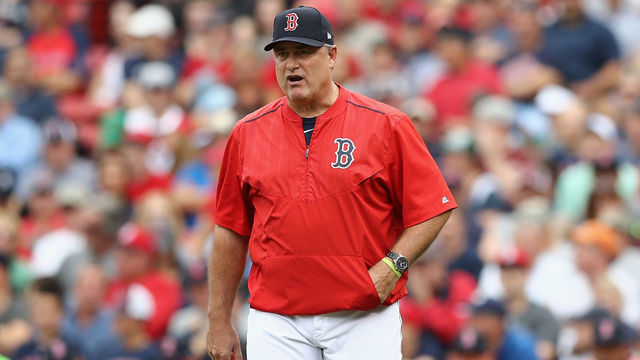 BOSTON, MA - OCTOBER 08: Manager John Farrell of the Boston Red Sox relieves Doug Fister #38 (not pictured) in the second inning against the Houston Astros during game three of the American League Division Series at Fenway Park on October 8, 2017 in Boston, Massachusetts.