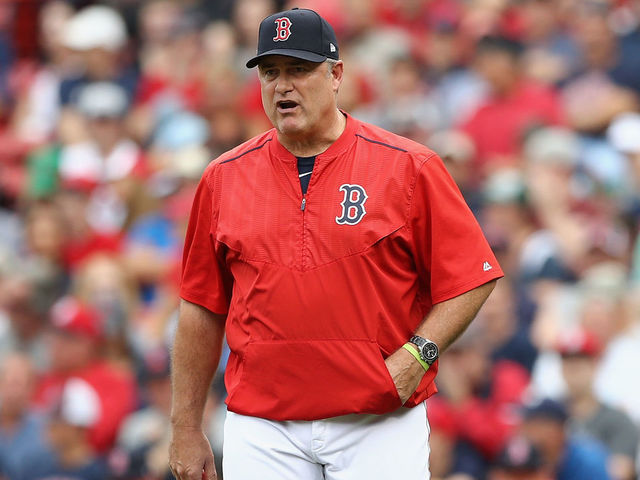 BOSTON, MA - OCTOBER 08: Manager John Farrell of the Boston Red Sox relieves Doug Fister #38 (not pictured) in the second inning against the Houston Astros during game three of the American League Division Series at Fenway Park on October 8, 2017 in Boston, Massachusetts.