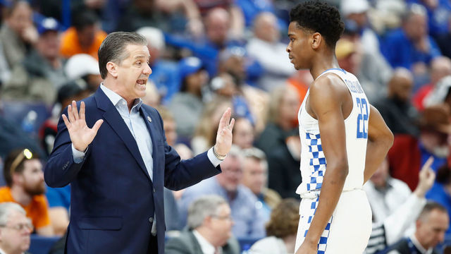 ST LOUIS, MO - MARCH 09: John Calipari the head coach of the Kentucky Wildcats gives instructions to Shai Gilgeous-Alexander #22 during the game against the Georgia Bulldogs during the quarterfinals round of the 2018 SEC Basketball Tournament at Scottrade Center on March 9, 2018 in St Louis, Missouri.