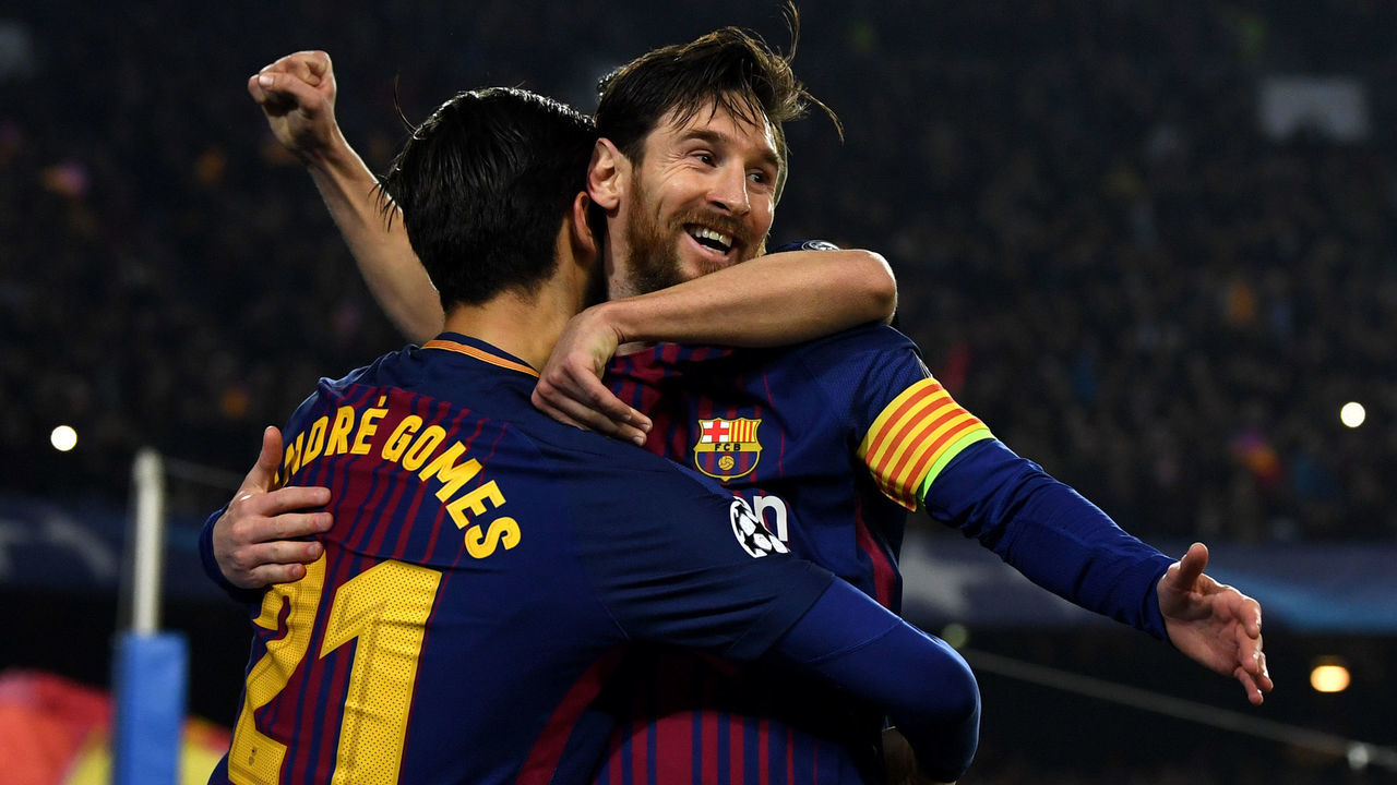 BARCELONA, SPAIN - MARCH 14: Lionel Messi of Barcelona celebrates with Andre Gomes as he scores their third goal during the UEFA Champions League Round of 16 Second Leg match FC Barcelona and Chelsea FC at Camp Nou on March 14, 2018 in Barcelona, Spain.