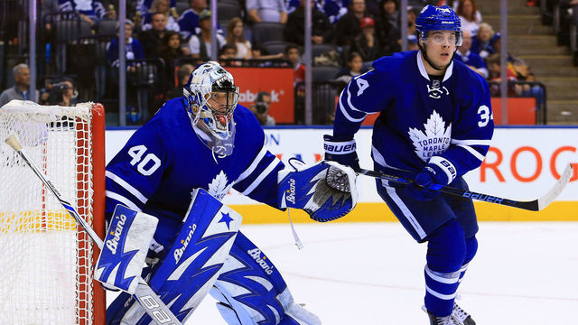TORONTO, CANADA - OCTOBER 02: Garret Sparks #40 and Auston Matthews #34 of the Toronto Maple Leafs watch for the puck during an NHL preseason game against the Montreal Canadiens at Air Canada Centre on October 2, 2016 in Toronto, Canada.