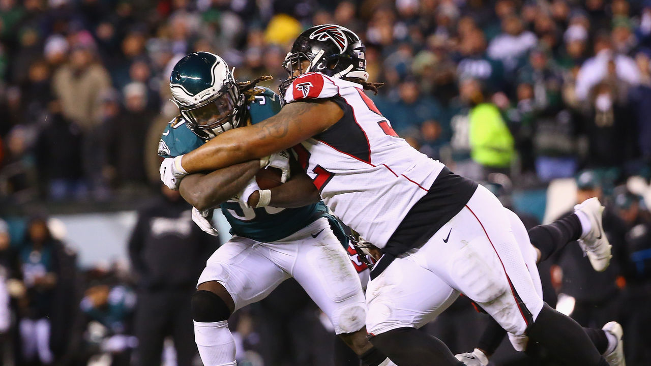 PHILADELPHIA, PA - JANUARY 13: Defensive back Randall Goforth #36 of the Philadelphia Eagles runs the ball and is tackled by defensive tackle Dontari Poe #92 of the Atlanta Falcons during the third quarter in the NFC Divisional Playoff game at Lincoln Financial Field on January 13, 2018 in Philadelphia, Pennsylvania.
